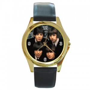 http://www.starsonstuff.com/16125-thickbox/the-beatles-gold-tone-metal-watch.jpg