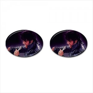 http://www.starsonstuff.com/19745-thickbox/elvis-presley-cufflinks-oval.jpg