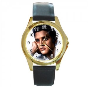 http://www.starsonstuff.com/21613-thickbox/elvis-presley-gold-tone-metal-watch.jpg