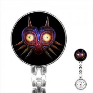 http://www.starsonstuff.com/22775-thickbox/legend-of-zelda-mask-stainless-steel-nurses-fob-watch.jpg