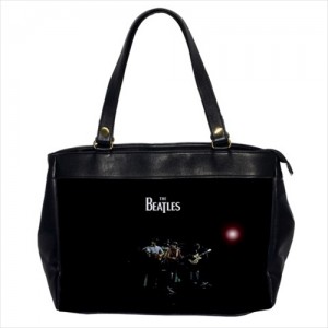 http://www.starsonstuff.com/23888-thickbox/the-beatles-oversize-office-handbag.jpg