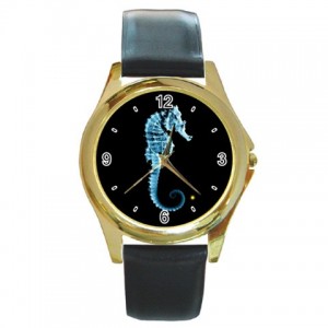 http://www.starsonstuff.com/5501-thickbox/the-fringe-glyph-gold-tone-metal-watch.jpg