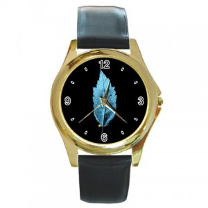 http://www.starsonstuff.com/5502-thickbox/the-fringe-glyph-gold-tone-metal-watch.jpg