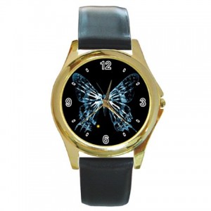 http://www.starsonstuff.com/5505-thickbox/the-fringe-glyph-gold-tone-metal-watch.jpg