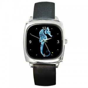http://www.starsonstuff.com/5632-thickbox/the-fringe-glyph-silver-tone-square-metal-watch.jpg
