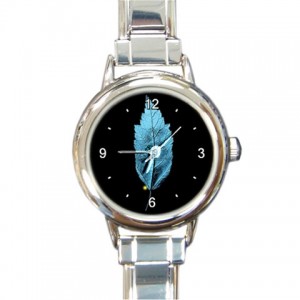 http://www.starsonstuff.com/5660-thickbox/the-fringe-glyph-round-italian-charm-watch.jpg