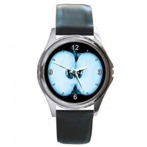 http://www.starsonstuff.com/5663-thickbox/the-fringe-glyph-silver-tone-round-metal-watch.jpg
