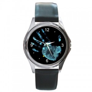 http://www.starsonstuff.com/5665-thickbox/the-fringe-glyph-silver-tone-round-metal-watch.jpg