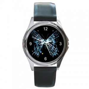 http://www.starsonstuff.com/5666-thickbox/the-fringe-glyph-silver-tone-round-metal-watch.jpg